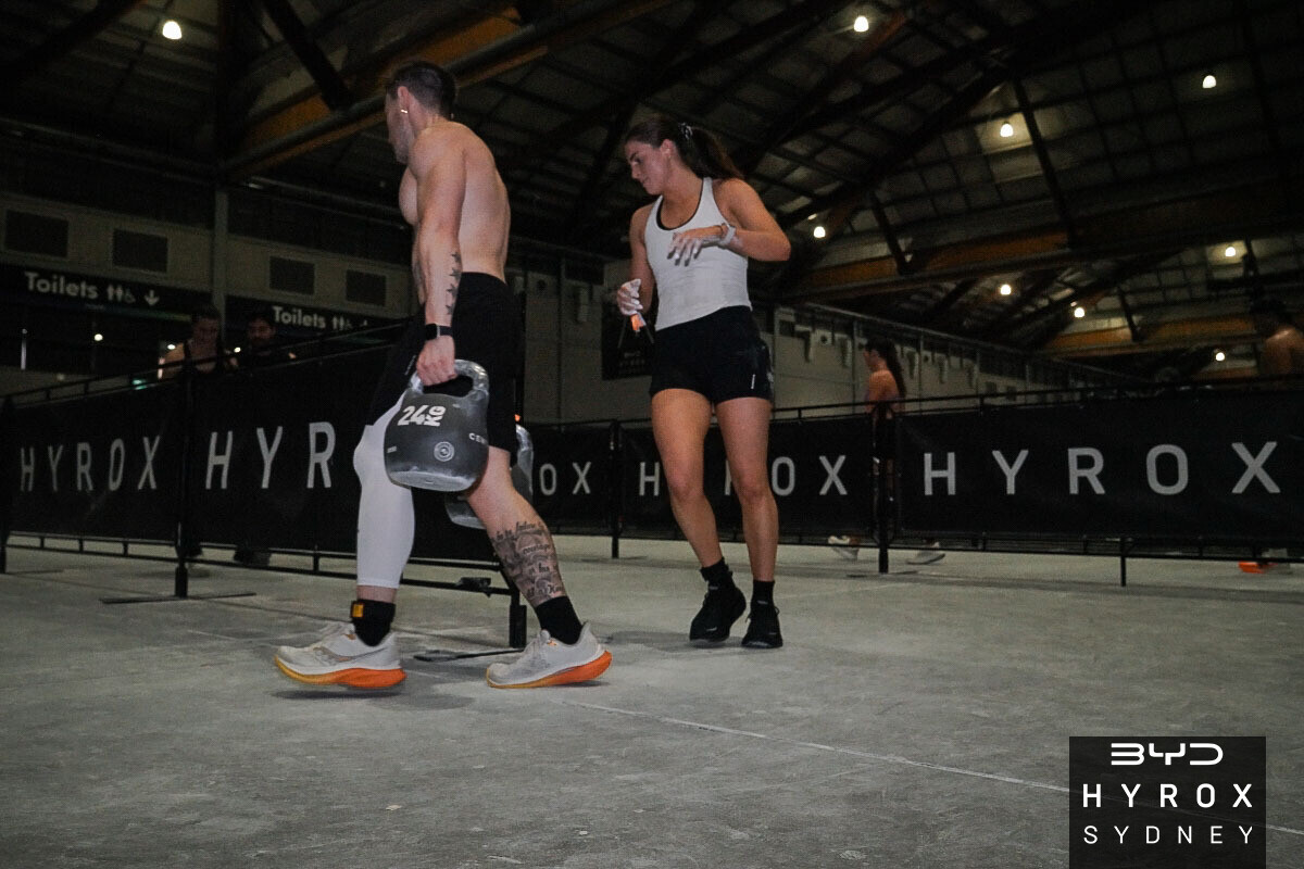 Hybrid HYROX farmers carry training with The Performance Coach